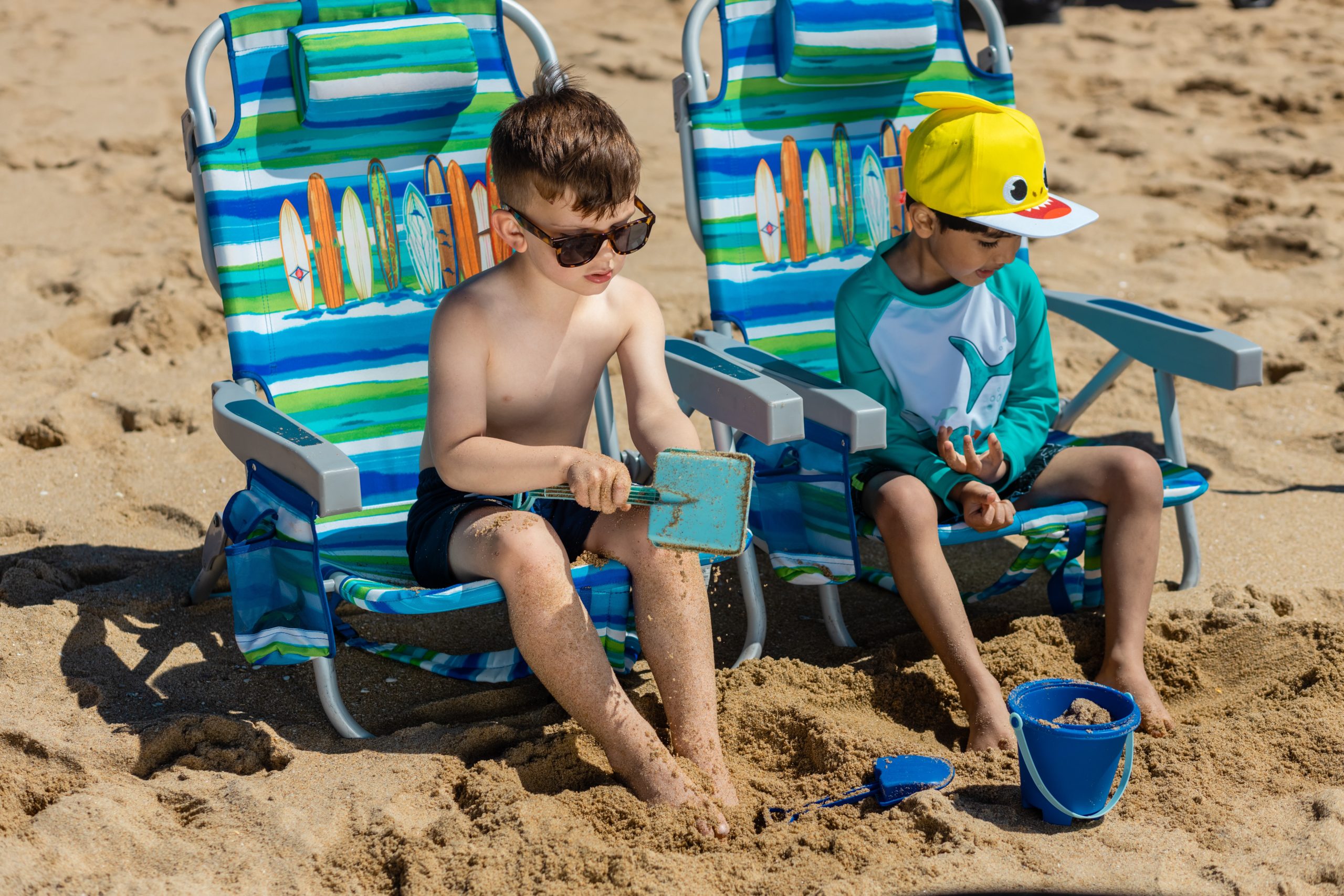 boys-sitting-in-beach-chairs